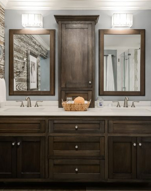 Bathroom cabinetry with matching mirrors